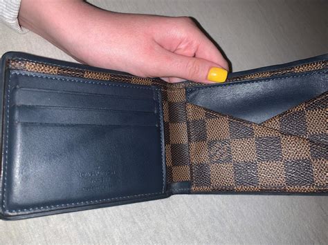 louis vuitton geldbörse herren fake|real louis vuitton.